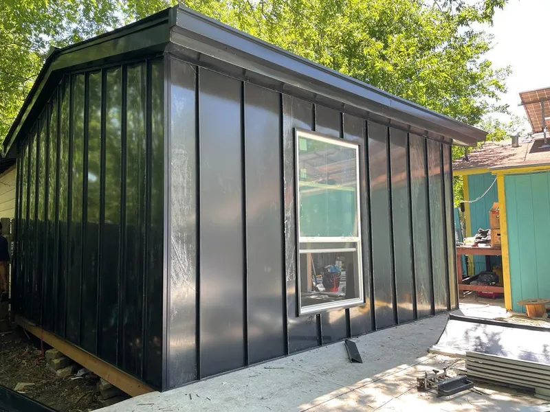 Black standing seam metal wall panels for Metal Roof Installation in Lunenburg